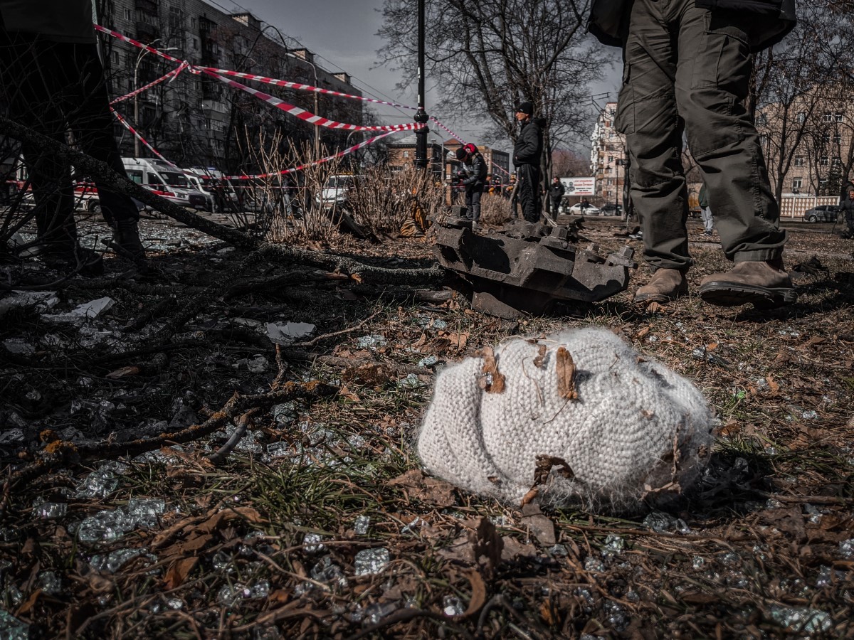 Knitted Hat Lying among Debris in Ukrainian City. Image source: https://www.pexels.com/photo/knitted-hat-lying-among-debris-in-ukrainian-city-11477794/