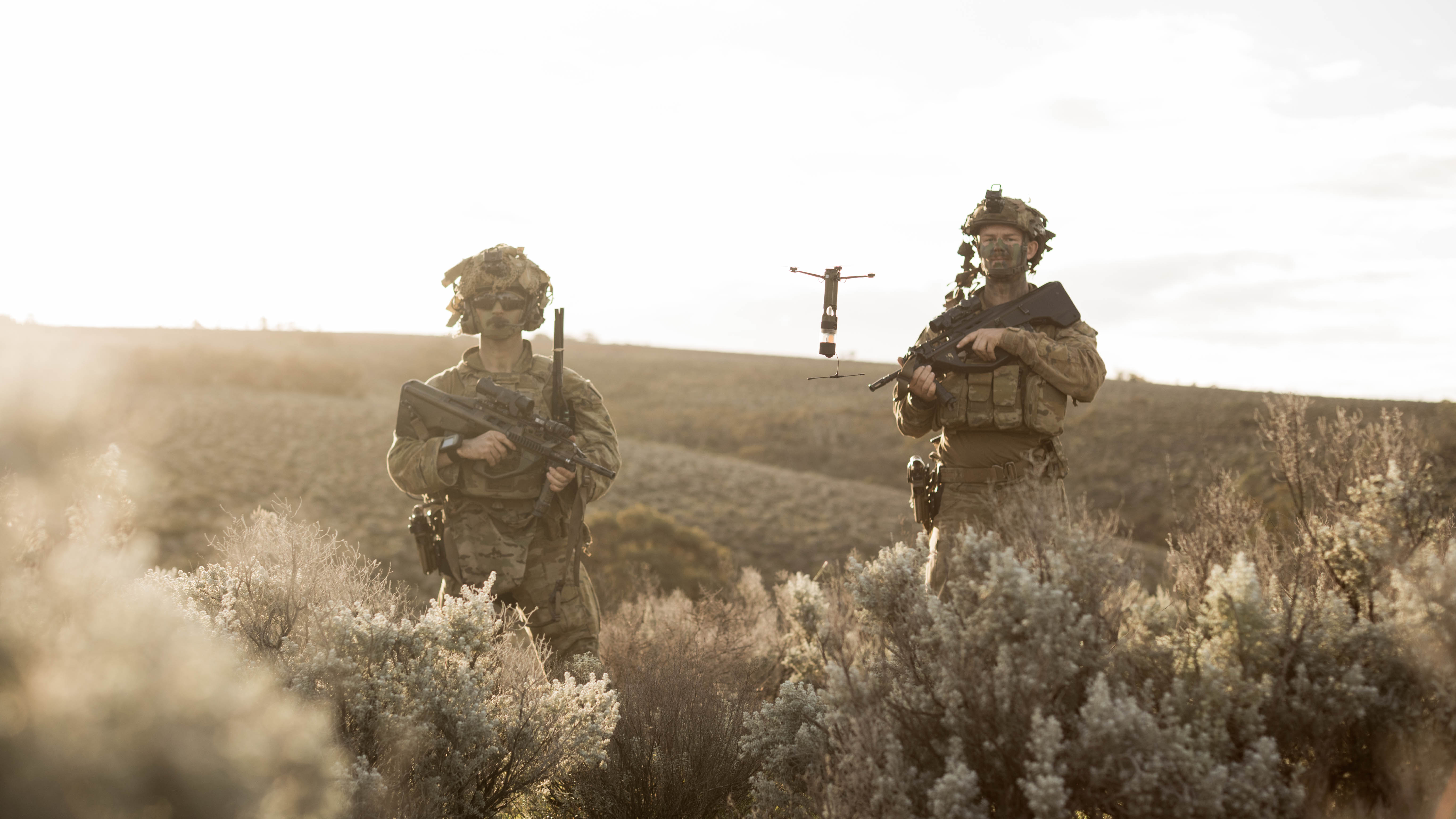 Two soldiers and a small UAS