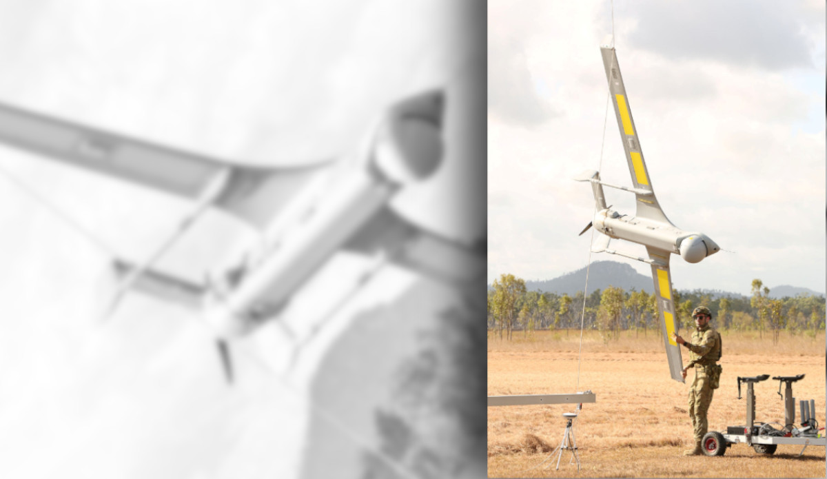 Australian Army soldier, Lance Bombardier Liam Wilson, from 20th Regiment, Royal Australian Artillery removes the Integrator Tactical Uncrewed Aerial System from the skyhook at Shoalwater Bay, Rockhampton, Queensland.