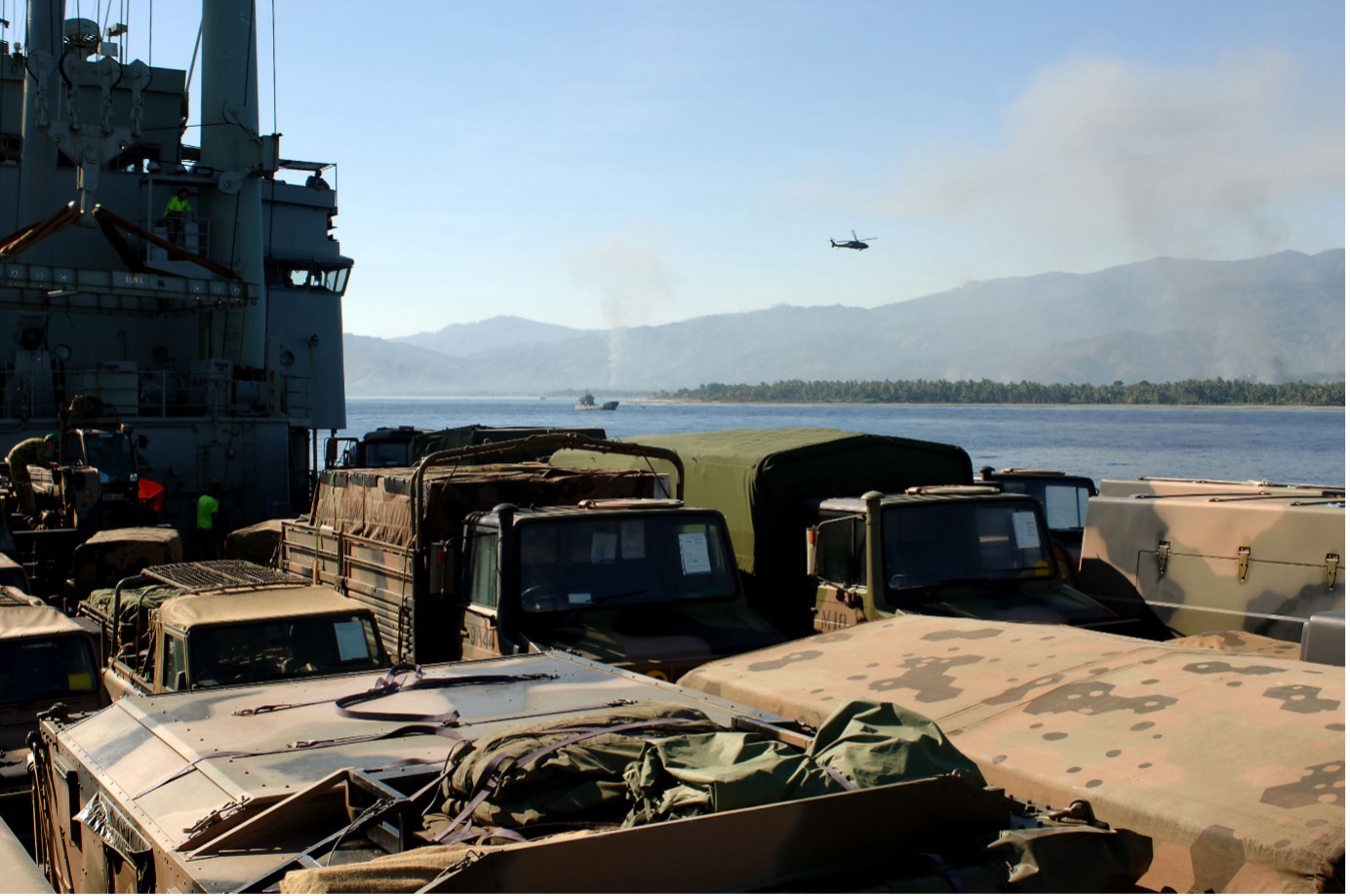 3. Army stores and vehicles sit on the Vehicle Deck onboard HMAS Tobruk