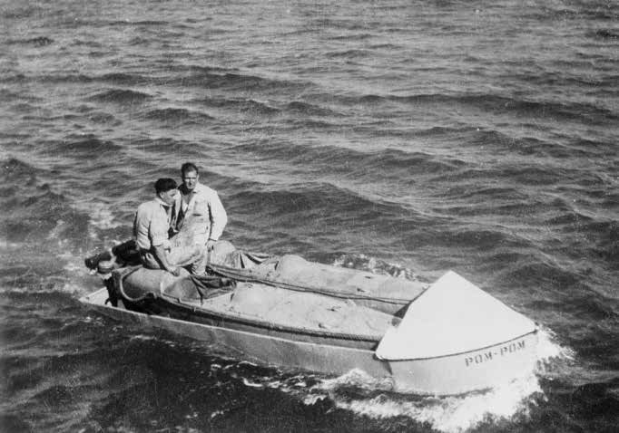 Two men in a small boat surrounded by open water.