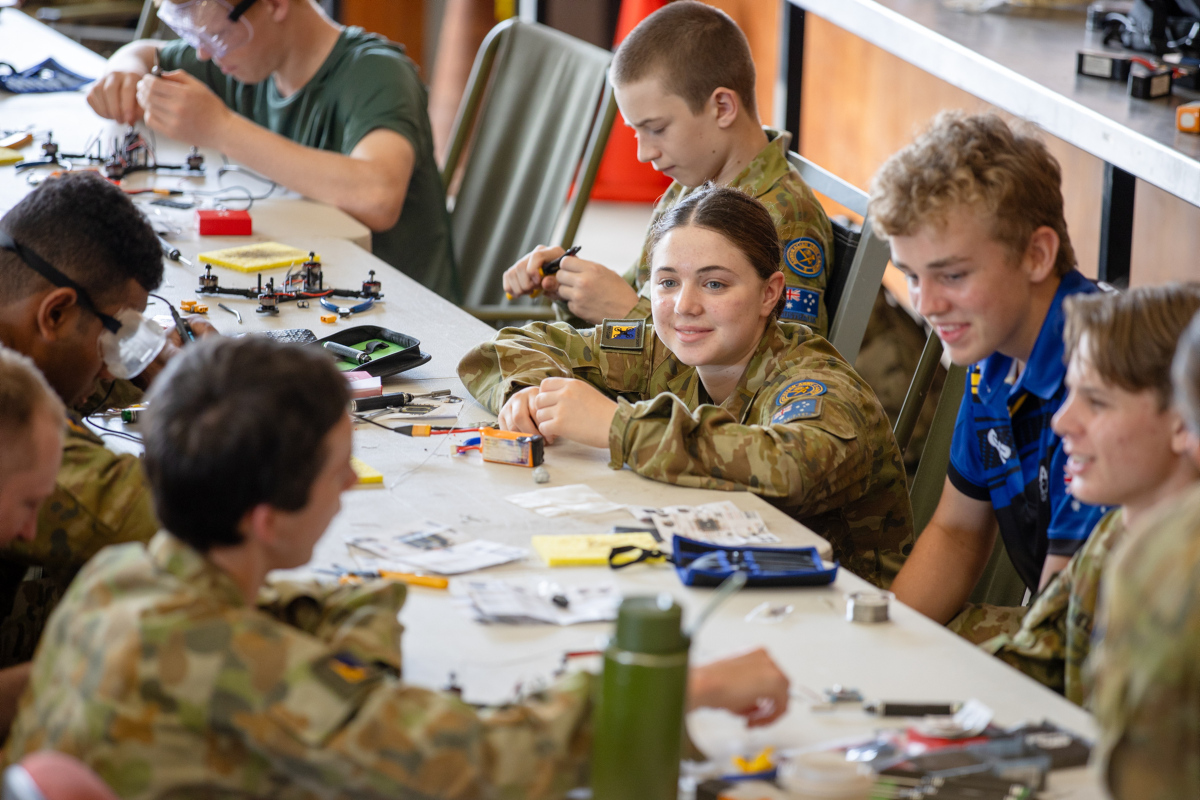 Australian Army Cadets collaborate on constructing drones during day one of the First Person View Drone Camp at Gallipoli Barracks.