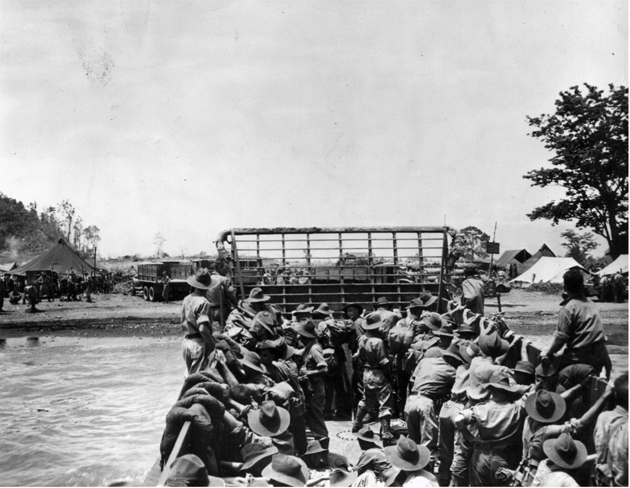 American landing craft brings Australian soldiers into a beach on the north coast of New Guine