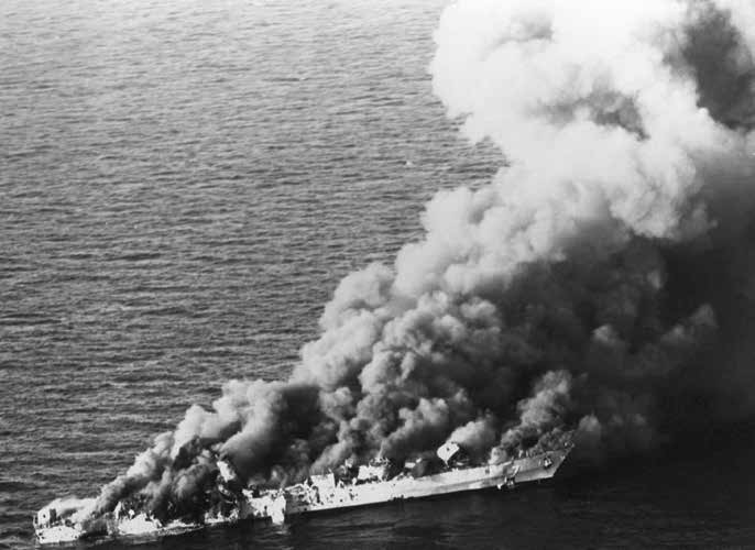 Iranian frigate Sahand on fire after Harpoon anti-ship missile strikes during OP Praying Mantis, 1988