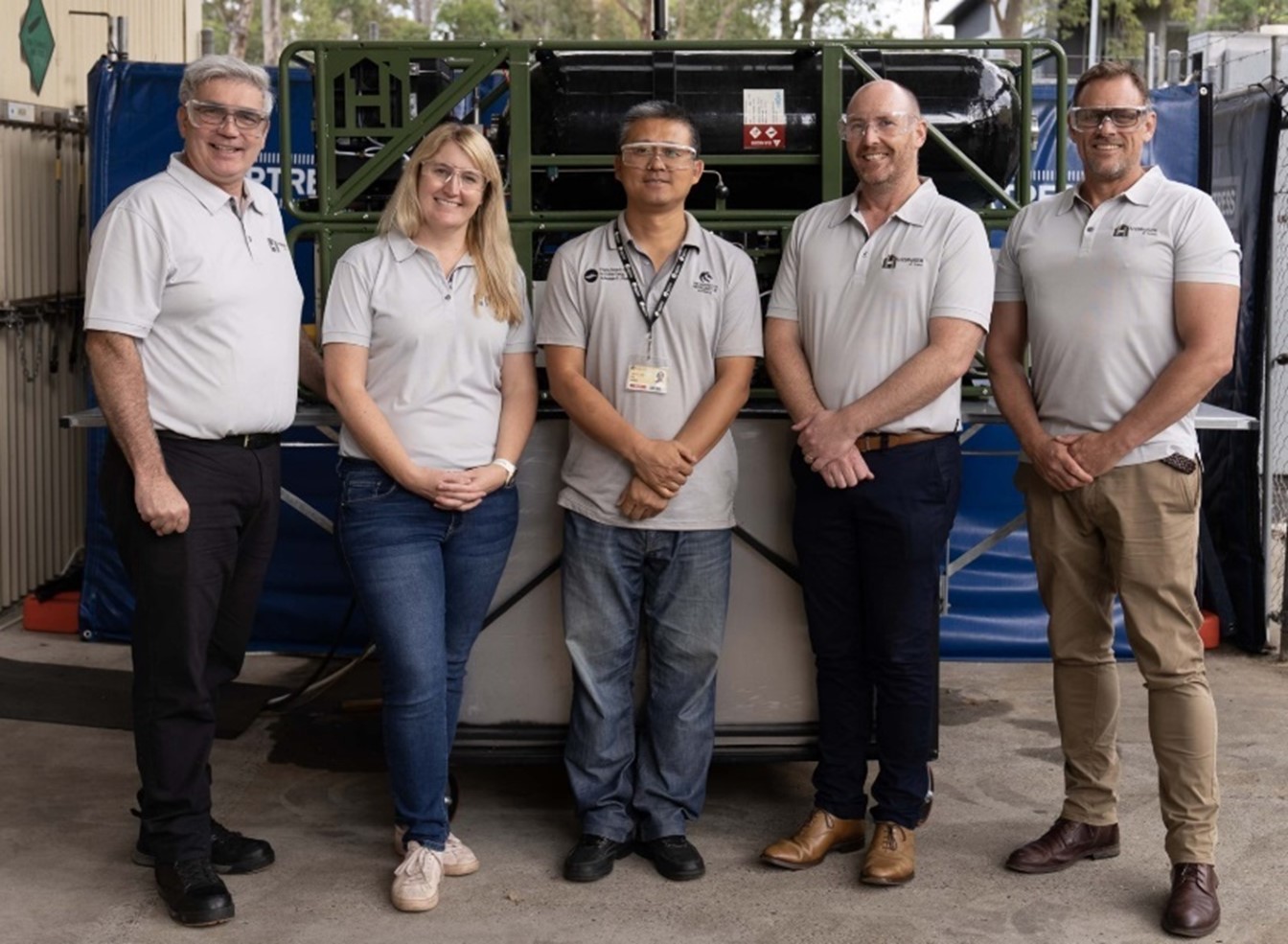 The Hydrogen at Home team at their workshop inside the National Institute of Energy Research and the University of Newcastle.