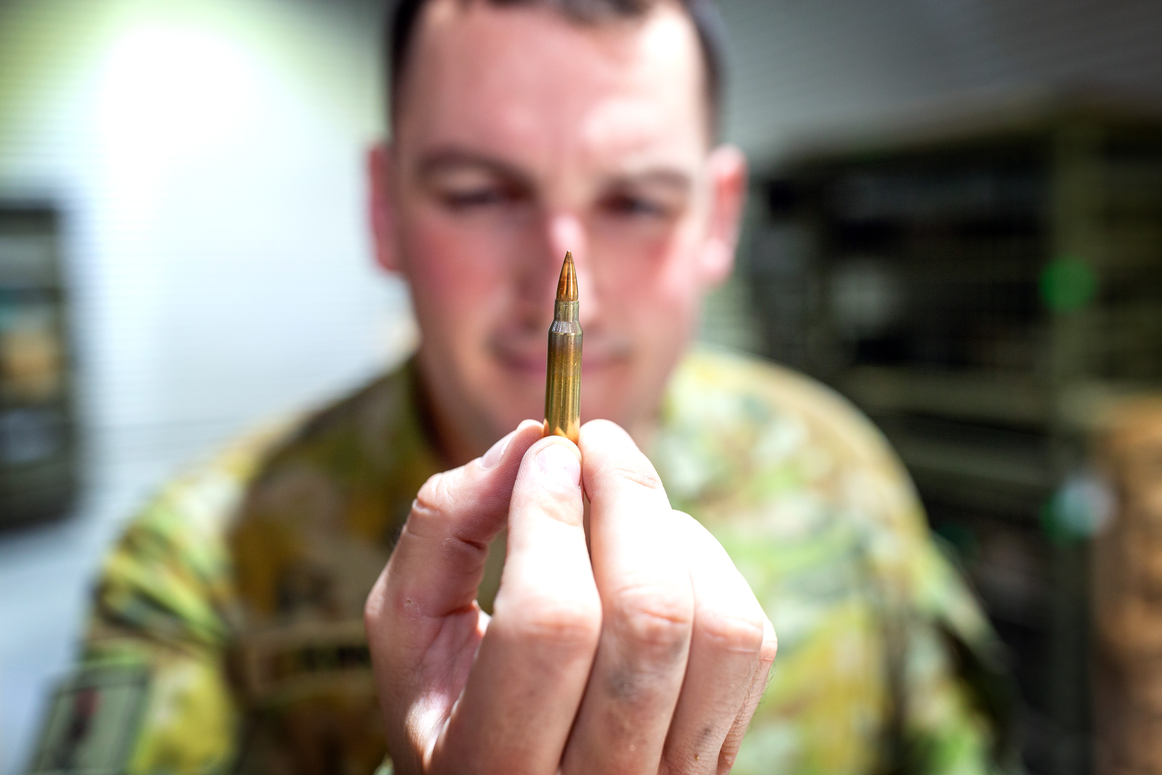 Australian Army soldier, Force Support Element Ammunition Technician Corporal Jack Kirkham, checks ammunition at Australia's main operating base in the Middle East.