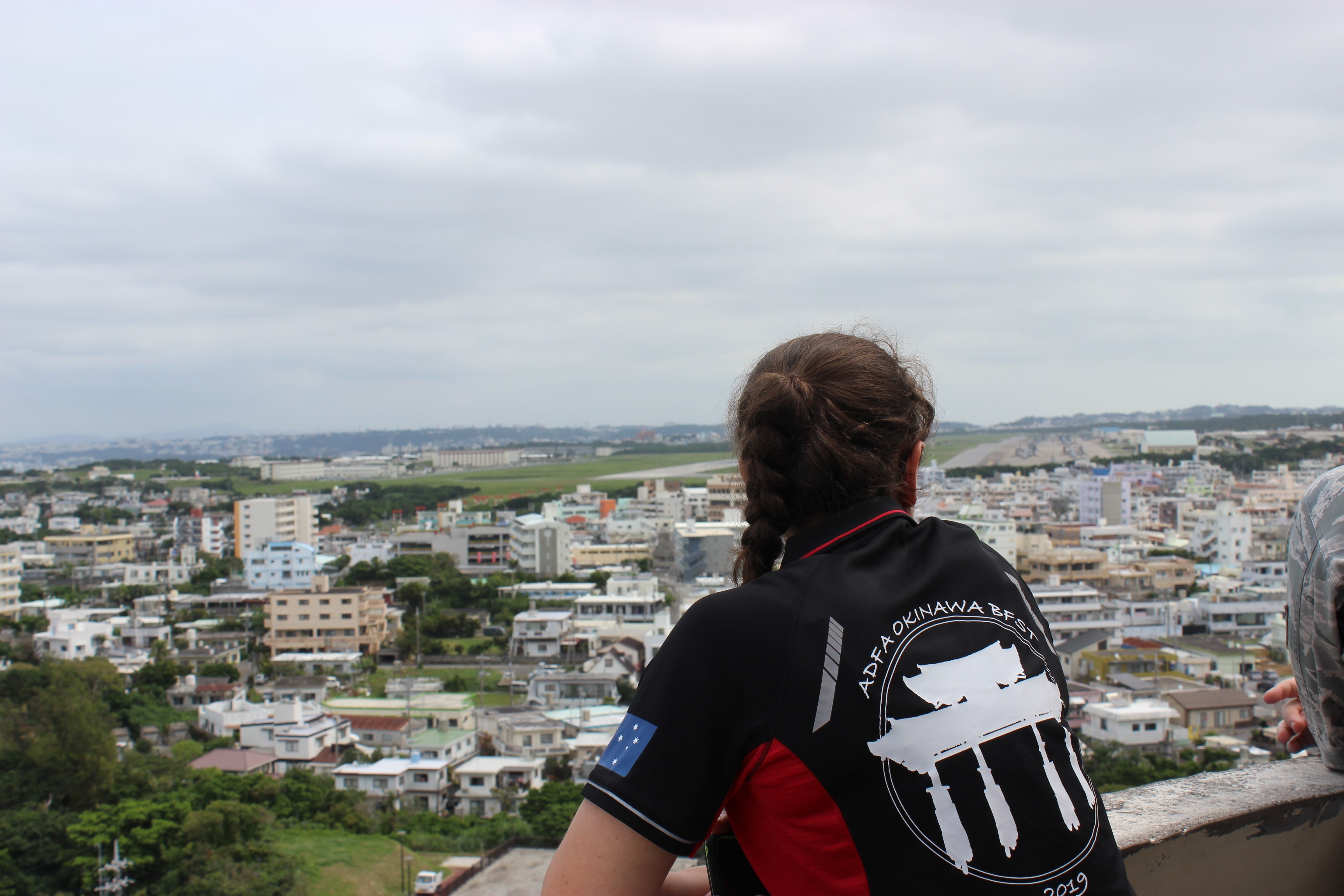 Toyah on Kakazu Ridge with USMC Air Station Futenma in the background