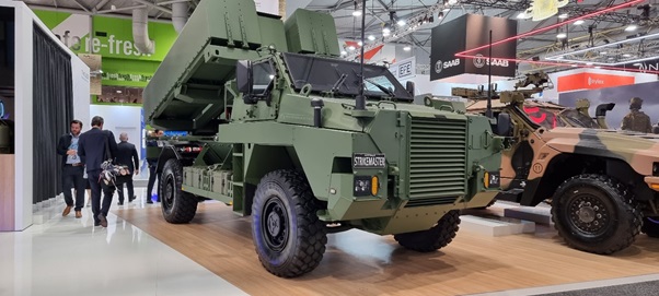 The Thales Strike Master vehicle on display alongside a Hawkei vehicle in the Brisbane Convention Centre.