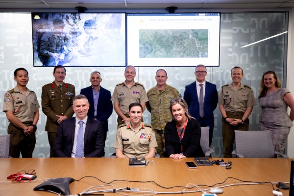 (front row l-r) General Manager Public Sector for Microsoft Australia Mark Leigh, Head Land Capability Major General Simon Stuart, AO, DSC, Microsoft Strategic Account Executive Maree Roughton with the Army’s Robotic and Autonomous Systems Implementation and Coordination Office during a demonstration on Artificial Intelligence hosted by Future Land Warfare Branch with Microsoft at the Land Network Integration Centre in Canberra