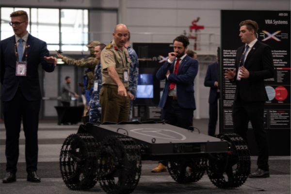 Australian Army Brigadier Kahlil Fegan, DSC, (centre left) at the Army Robotics Expo and Quantum Technology Challenge at the Brisbane Convention and Exhibition Centre.