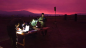 Soldiers from 20 Regiment, Royal Australian Artillery, gather around their workstation as they guide their AE Wasp III Small Unmanned Aircraft System (SUAV) over the Orroral Valley fire in the south of the Australian Capital Territory. The aircraft are being used to monitor spot fires in the Tharwa area in the early morning hours when helicopters are not operating. Integrated into the massive ACT Emergency Services Agency’s intelligence collection capabilities, the small reconnaissance aircraft are fitted w