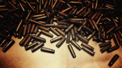 Empty bullet casings on a surface