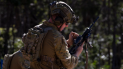 Soldier holding cocking handle