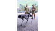 Australian Army Craftsman Sean Van Der Heyden, from the 3rd Battalion, Royal Australian Regiment, receives instruction from Major Ashley Crosby during the Army Headquarters Robotic demonstration at Lavarack Barracks, 31 July 2020.