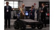 Australian Army Brigadier Kahlil Fegan, DSC, (centre left) at the Army Robotics Expo and Quantum Technology Challenge at the Brisbane Convention and Exhibition Centre.