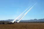 High Mobility Rocket Artillery Systems of the United States Army and United States Marine Corps launch rockets during a firepower demonstration held at Shoalwater Bay Training Area in Queensland, during Talisman Sabre 2021.