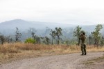 An Australian Army Joint Terminal Attack Controller surveys landscape prior to conducting training serials at the Townsville Field Training Area in Queensland, during Exercise Talisman Sabre 2021.