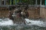 An Australian Army rifleman from the 6th Battalion, The Royal Australian Regiment jumps in the a ‘bear pit’ during the obstacle course as part of the final battle run on Exercise Viper Strike at Gallipoli Barracks, Queensland.