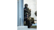 Australian Army soldiers from the 1st Battalion, The Royal Australian Regiment conduct a raid on the Urban Operations Training Facility as a part of Exercise Sea Raider.