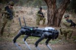 Australian Army soldier Sergeant Rana Chandan (centre) from the 1st/15th Royal New South Wales Lancers operates a Ghost Robotics quadruped robot using a novel brain-computer interface during a demonstration at Majura Training Area, Canberra.