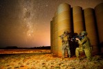 U.S. Marine Corps Lance Corporal Dexter Madrigal from Marine Rotational Force-Darwin 22 and Australian Army Private. Daniel Rochford from16th Battalion, Royal Western Australian Regiment, pose for a photograph under the stars at RAAF Base Curtin during Exercise Koolendong 2022.