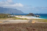 U.S. Marine Corps MV-22 Ospreys and CH-53E Super Stallions land during an amphibious raid for a multinational littoral operations exercise as part of Rim of the Pacific (RIMPAC) 2022.