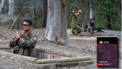 An officer from the New Caledonian Armed Forces and an Australian Army soldier signal the end of live firing during Exercise Hydra 2019 at Greenbank Training Area, Queensland, Australia.