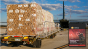 Personal Protective Equipment, destined for Indonesia, prior to being loaded on to a No. 37 Squadron C-130J Hercules at RAAF Base Amberley.