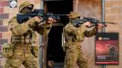 An Australian Army soldier and Army Reserve soldier conduct urban close combat clearances, during an integration activity at Townsville Field Training Area in Queensland, during Exercise Talisman Sabre 2021.