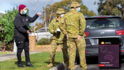 Department of Health and Human Services officer, Georges Haddad (left) and Australian Army soldiers from the 2nd/14th Light Horse Regiment, Trooper Keegan Veivers (centre) and Trooper Rylan Green (right) conduct door knocking in Colac, Victoria during Operation COVID-19 Assist.