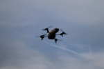 Single quad rotor drone in centre of image with sky background. Image by andri333 from Pixabay.