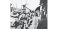 Australian troops of the British Military Mission 204 march to the front in Jiangxi province - Australian War Memorial (AWM).