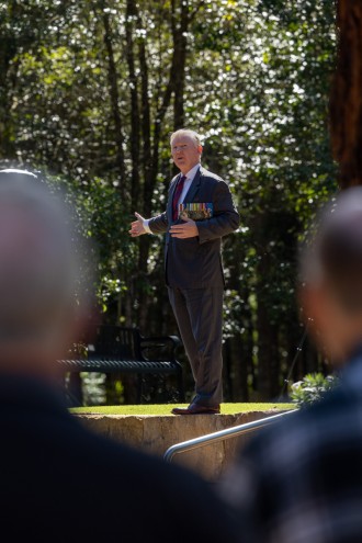 Major General Stephen Day, DSC, AM President of RSL Queensland, addresses guests at the Can Nha memorial at Kokoda Barracks in Canungra, Queensland.