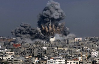 Explosion with Gaza in foreground