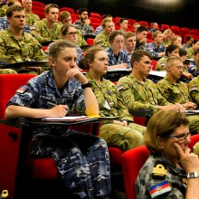 Defence personnel listen to the co-founder of the White Ribbon global movement, Dr Michael Kaufman, during his presentation at the Australian Defence Force Academy on 23 November, 2016.