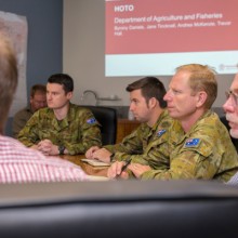 Australian Army officers from Joint Task Force 646 and representatives from the Department of Agriculture, Fisheries and Forestry, attend a hand over, take over meeting at McKinlay Shire Council.