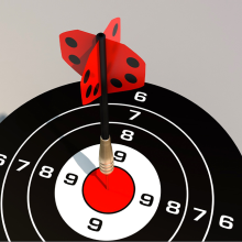 Dartboard with one dart in centre