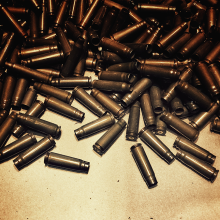 Empty bullet casings on a surface
