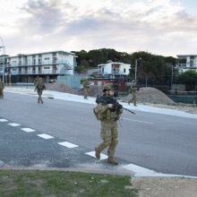 Army Reserve soldiers from 13th Brigade on patrol in search of suspects of interest during a simulated scenario as part of 13th Brigade stability operations training at HMAS Stirling in Western Australia.