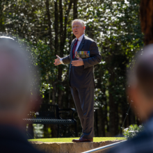 Major General Stephen Day, DSC, AM President of RSL Queensland, addresses guests at the Can Nha memorial at Kokoda Barracks in Canungra, Queensland.