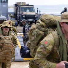 Australian Army personnel from 6th Engineer Support Regiment disembark from one of HMAS Canberra's landing craft in Port Vila during Operation Vanuatu Assist 2023.
