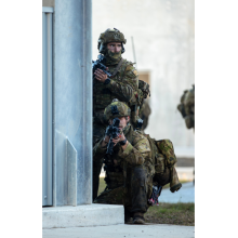 Australian Army soldiers from the 1st Battalion, The Royal Australian Regiment conduct a raid on the Urban Operations Training Facility as a part of Exercise Sea Raider.