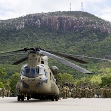 An Australian Army CH-47 Chinook Helicopter from the 5th Aviation Regiment rests on the hard-standing at the 3rd Brigade Combined Arms at Lavarack Barracks, Townsville.