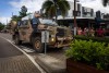 An Australian Army Bushmaster Protective Mobility Vehicle from 3rd Combat Engineer Regiment drives through the street during the Freedom of Entry Parade at Airlie Beach, Queensland.