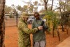 Australian Army soldier Private James Halliday Heath teaches Amata community member Roslyn Lewis how to capture still images using a digital SLR camera that will be donated to the Amata community on completion of the 2024 Army Aboriginal Community Assistance Programme, South Australia.