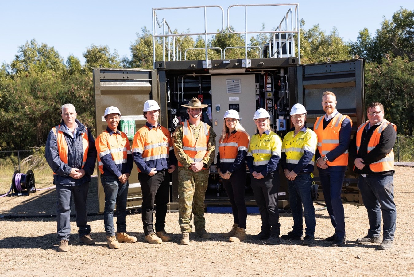 The Eclips Logistics team and Major Josh Mickle at their testing site in Brisbane. 